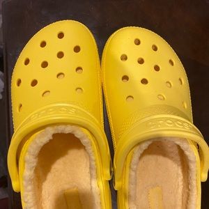 Yellow crocs with fur inside size 9.